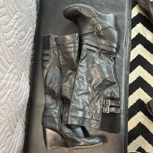 Black tall wedge boots